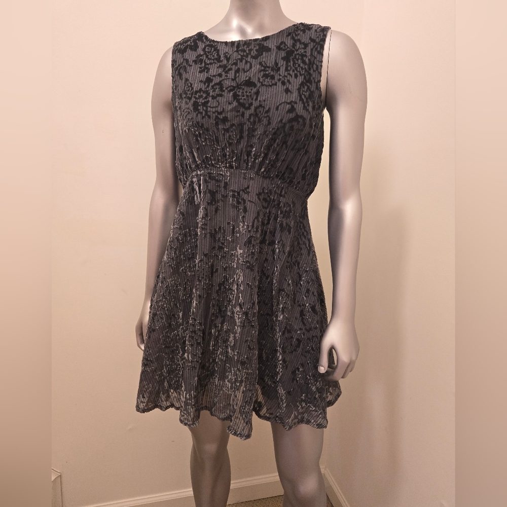 Silver Sparkly Free People mini dress in a size 2